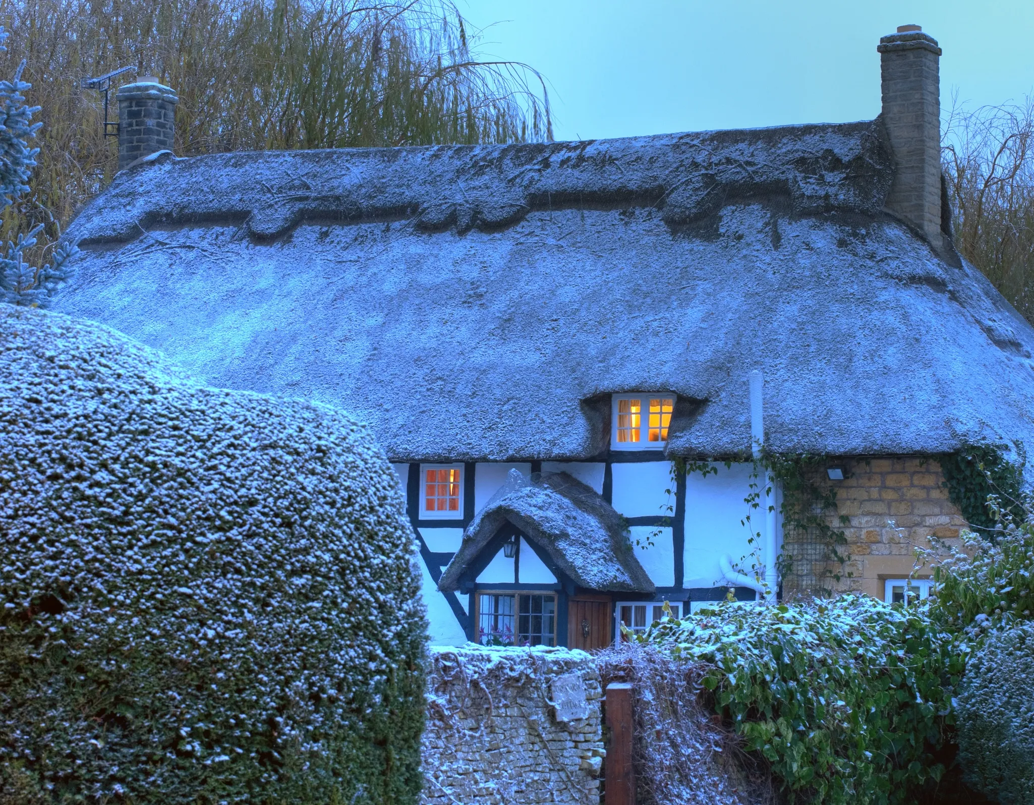 Thatched cottage in winter