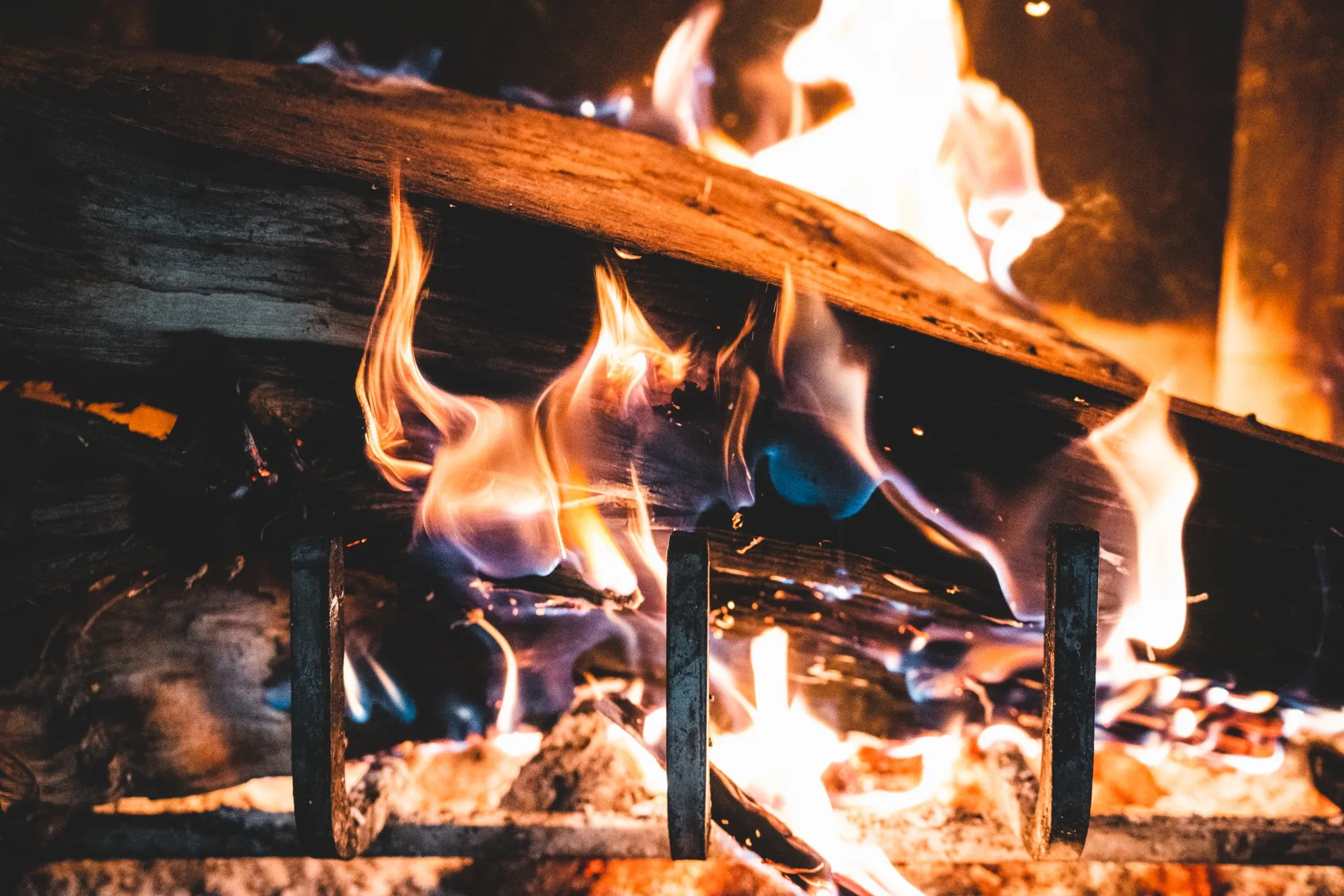 Wooden log on fire in listed property