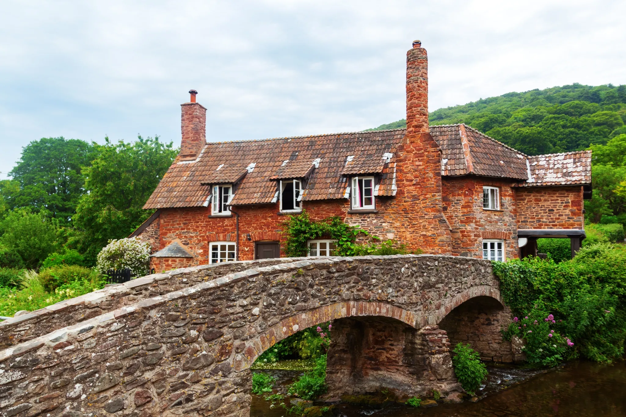 Old stone cottage near bridge