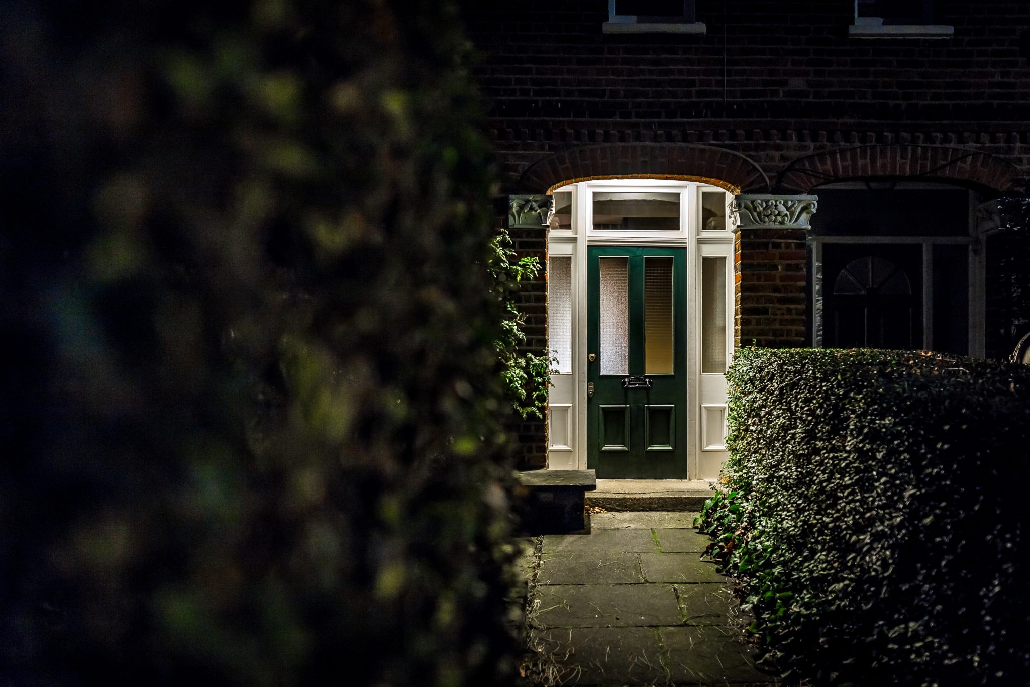 Listed property with lights on at night